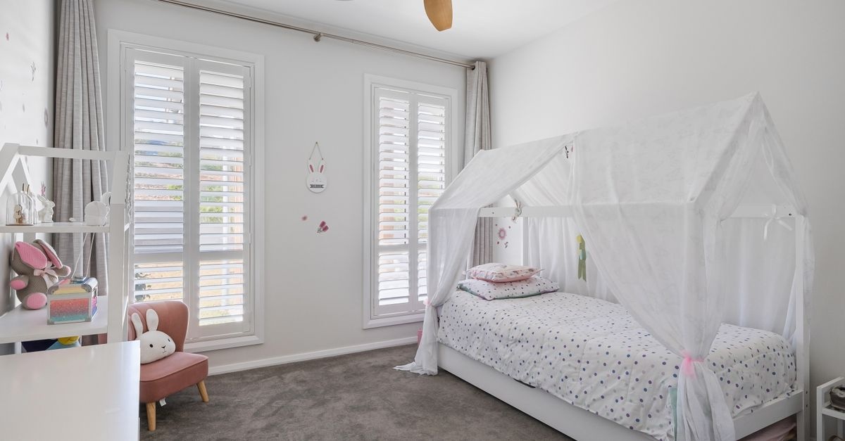 Little Hideaways: Crafting a Whimsical Kids’ Room Centered on a House-Shaped Bed