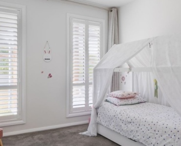 Little Hideaways: Crafting a Whimsical Kids’ Room Centered on a House-Shaped Bed